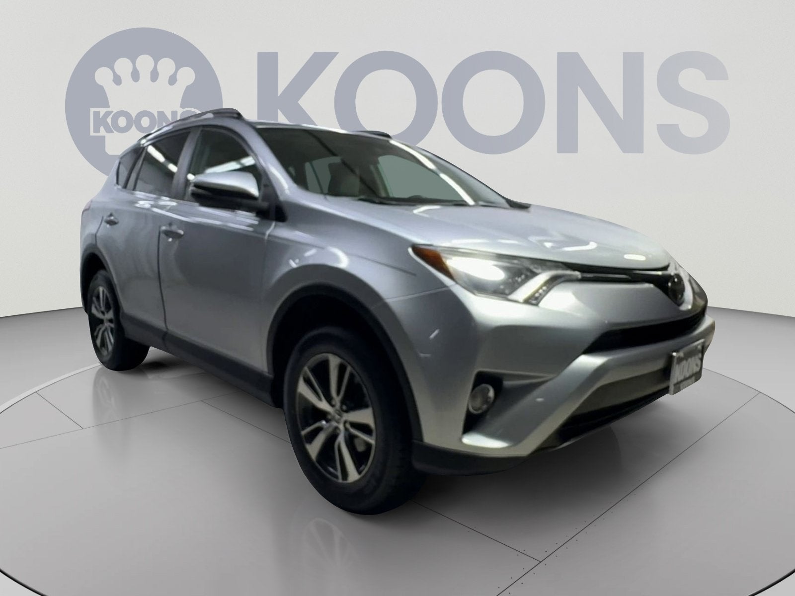 Certified 2018 Toyota RAV4 XLE with VIN 2T3RFREV2JW714448 for sale in Arlington, VA